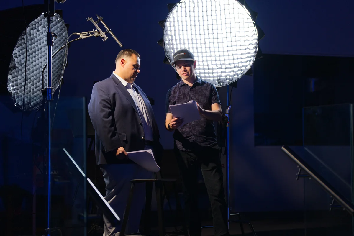 Dan Ovalle reviewing a filming plan with a client